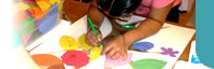 University of Arizona, Zuckerman College of Public Health, Seeds of Wellness Program: Young community member creating a Wellness Tree, a community needs/assets assessment activity.  Photographer: Seeds of Wellness staff.